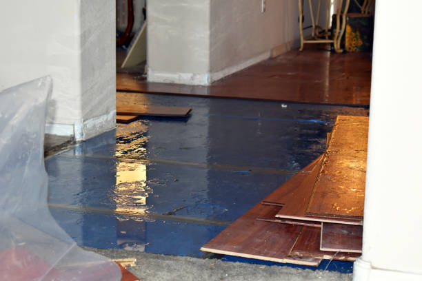 Professional Flood Damage Repair technician working in Cornish, ME
